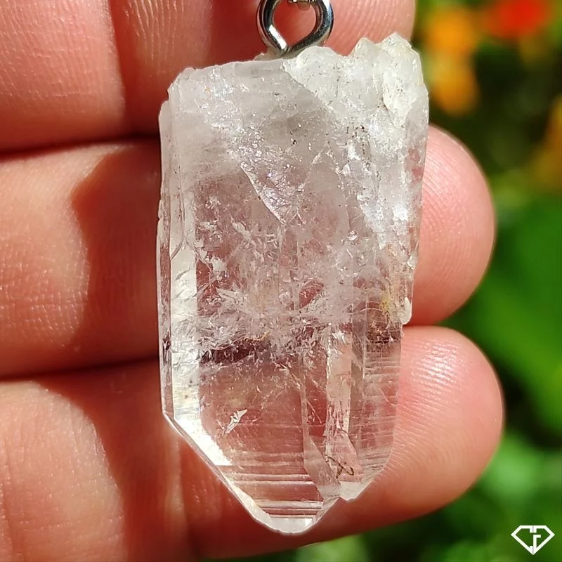 Pendentif en Cristal de roche brut