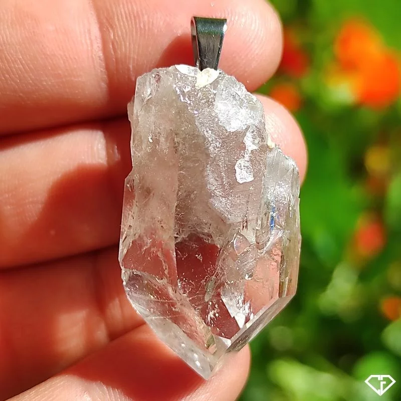 Pendentif en Cristal de roche brut